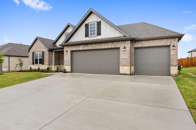 219 Briarwood Dr, Nevada, TX 75173 - view of front of home featuring driveway, board and batten siding, an attached garage, and roof with shingles