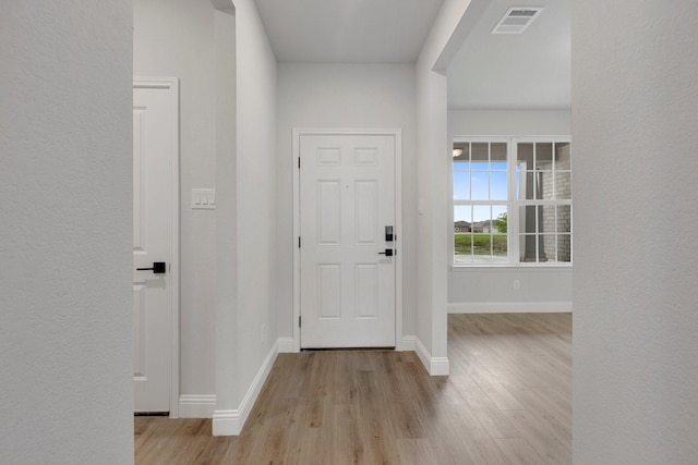219 Briarwood Dr, Nevada, TX 75173 - foyer entrance with wood finished floors and baseboards