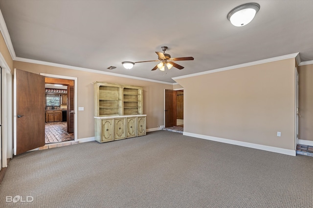 unfurnished living room with ceiling fan, crown molding, and carpet floors