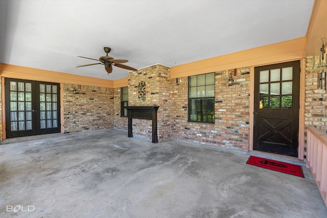 view of patio with french doors and ceiling fan