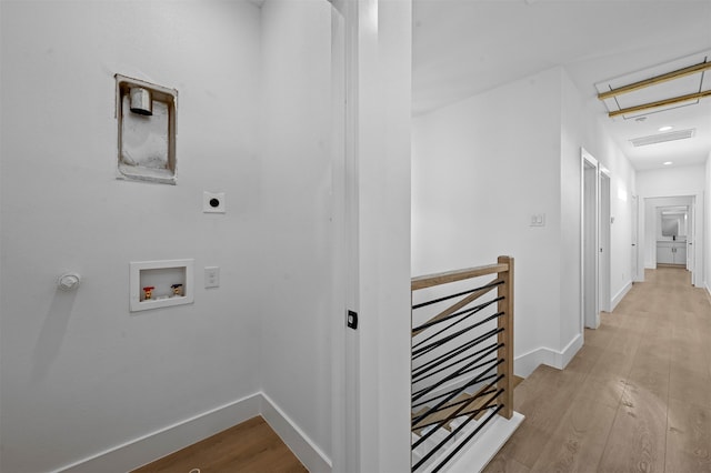 hallway featuring light hardwood / wood-style floors