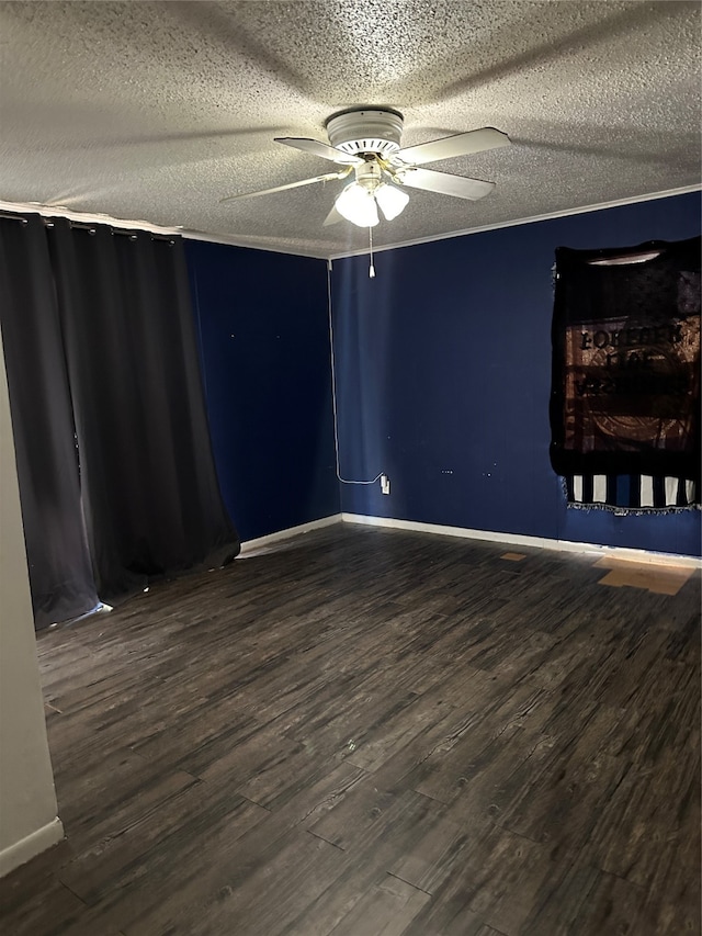 unfurnished room featuring hardwood / wood-style flooring, ceiling fan, and a textured ceiling