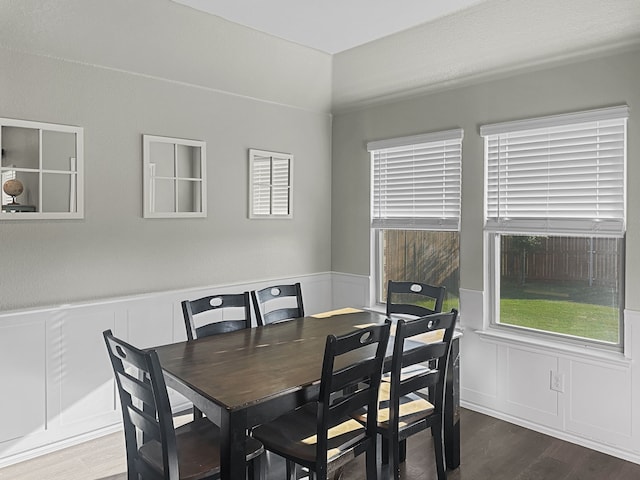 dining area with hardwood / wood-style floors