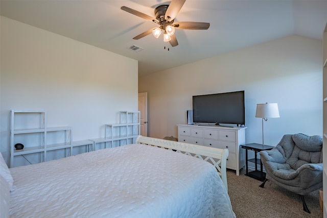 carpeted bedroom with ceiling fan and lofted ceiling