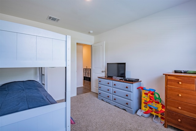 bedroom with light carpet