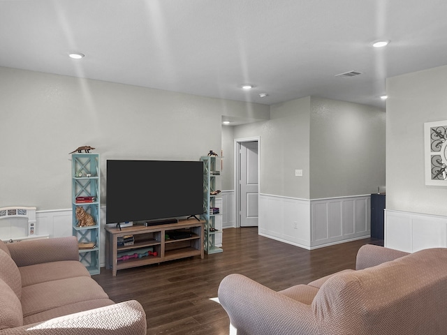 living room with dark wood-type flooring