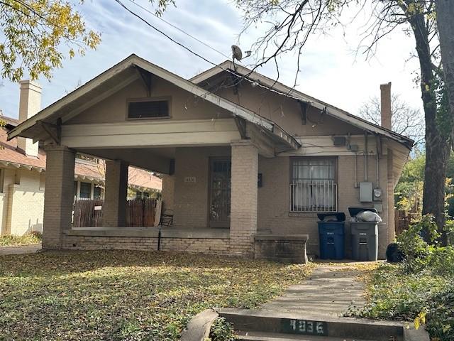 view of front of property featuring covered porch