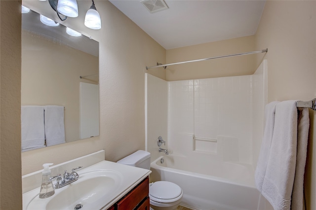 full bathroom featuring shower / tub combination, vanity, and toilet