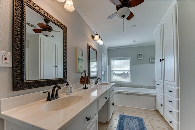 bathroom with ceiling fan, a bathing tub, tile patterned floors, crown molding, and vanity