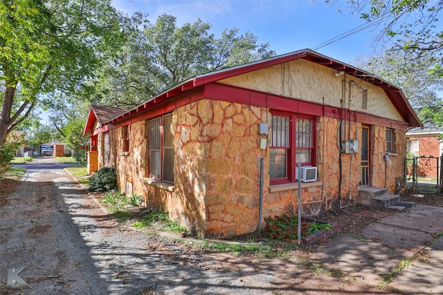 view of property exterior featuring cooling unit