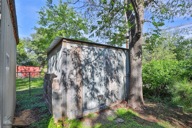 exterior space with a storage shed