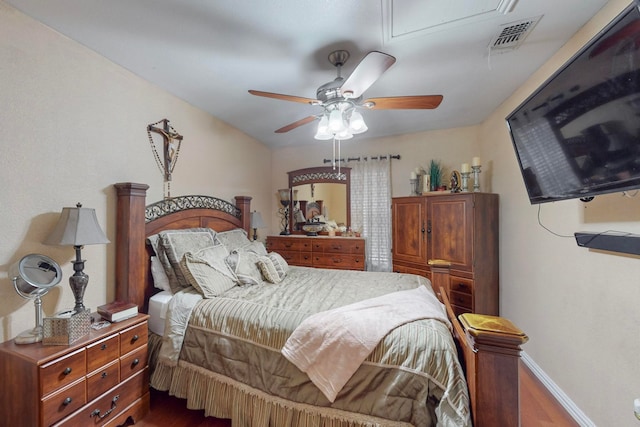 bedroom with hardwood / wood-style flooring and ceiling fan