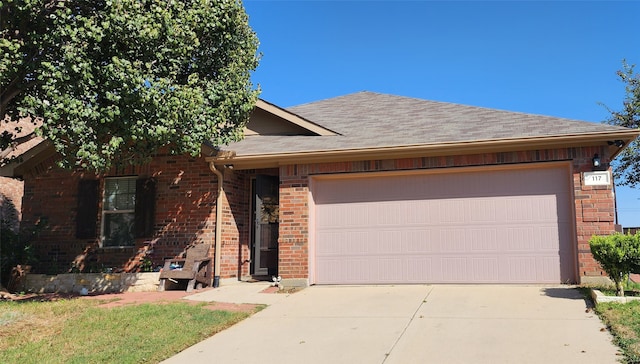 single story home with a garage