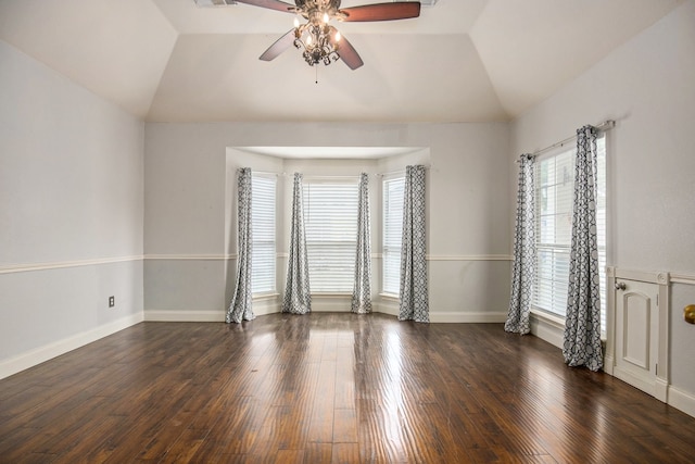 unfurnished room featuring lofted ceiling, dark hardwood / wood-style floors, and ceiling fan