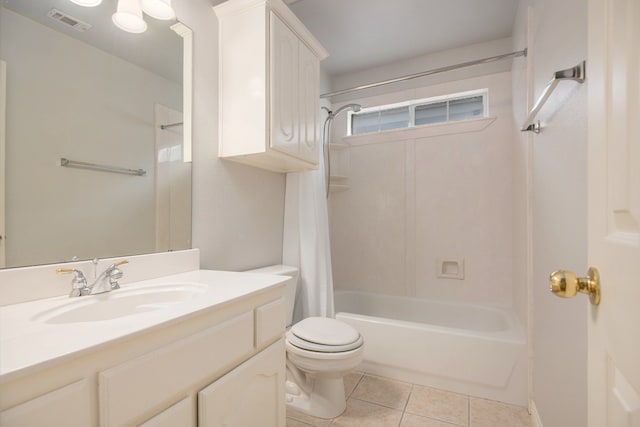 full bathroom with tile patterned floors, toilet, shower / bath combination, and vanity