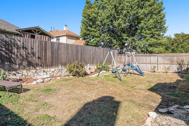 view of yard featuring a playground