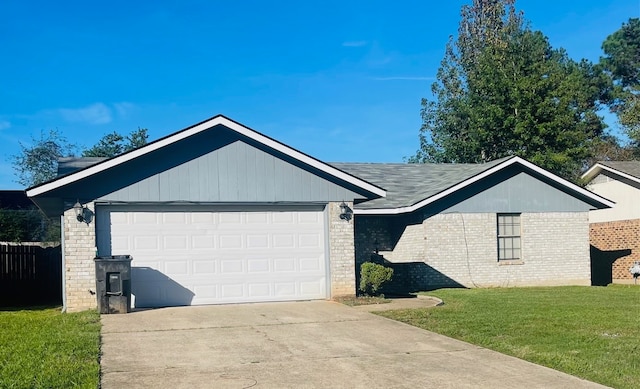 single story home featuring a garage and a front yard