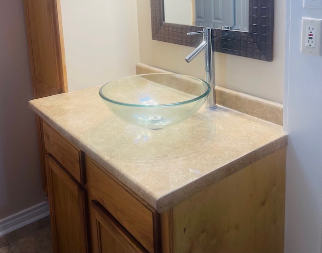 bathroom featuring vanity and tile patterned flooring