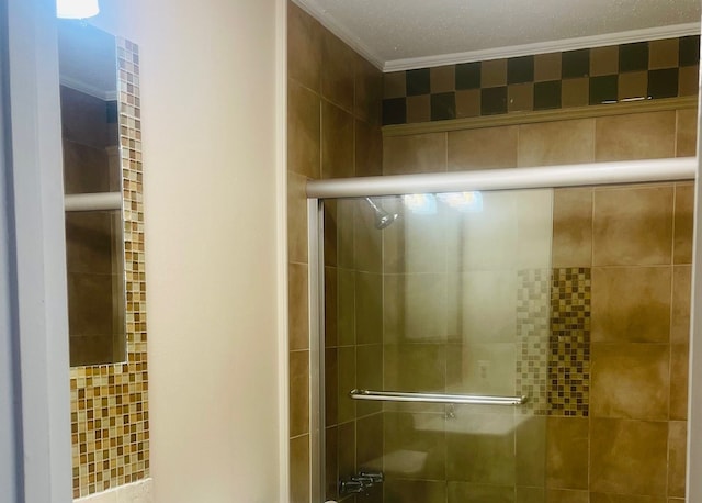 bathroom with walk in shower and ornamental molding