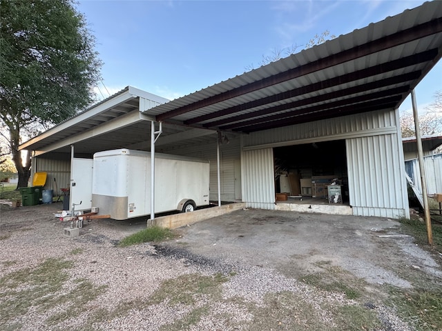 view of side of property with an outdoor structure