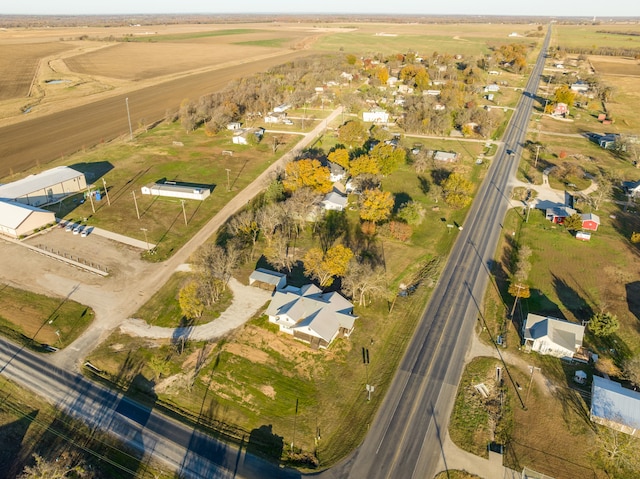 birds eye view of property featuring a rural view