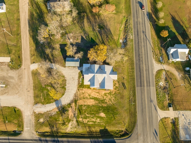 birds eye view of property featuring a rural view