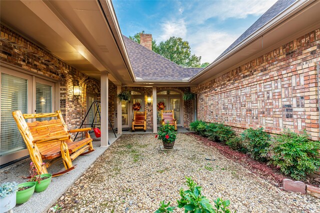 entrance to property with a patio