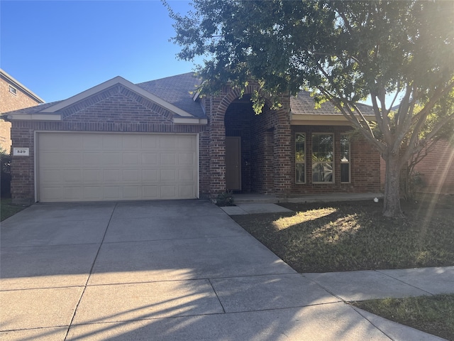 view of front of home with a garage