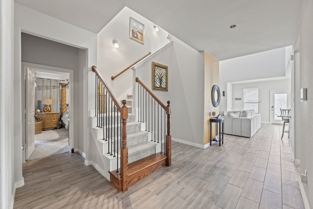 staircase featuring hardwood / wood-style flooring