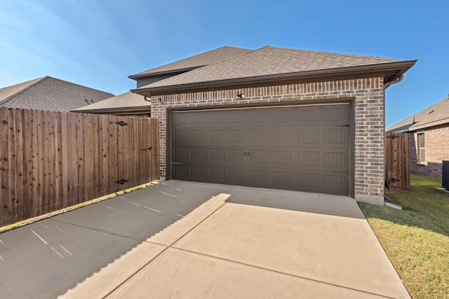 garage featuring a yard