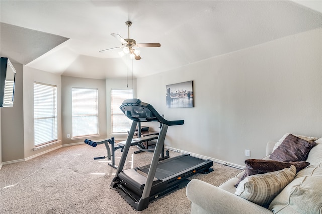 exercise room with ceiling fan and carpet floors