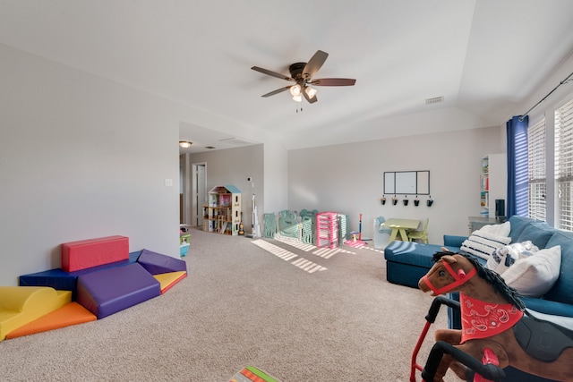 rec room with carpet flooring and ceiling fan