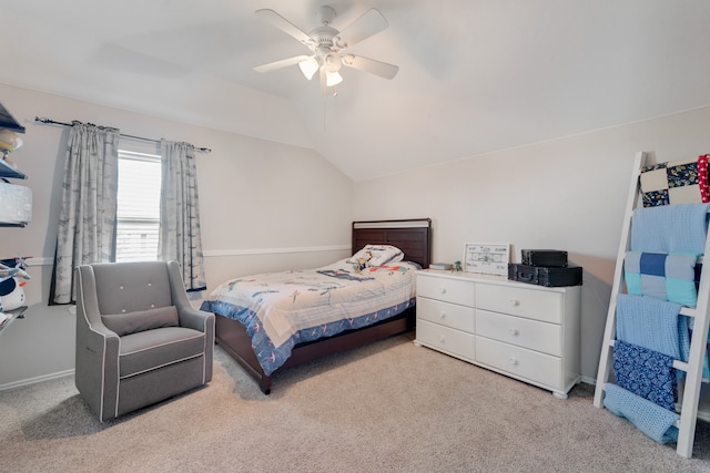 bedroom with light colored carpet, ceiling fan, and lofted ceiling