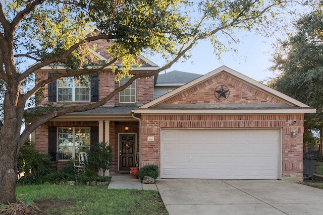 craftsman-style home with a porch and a garage