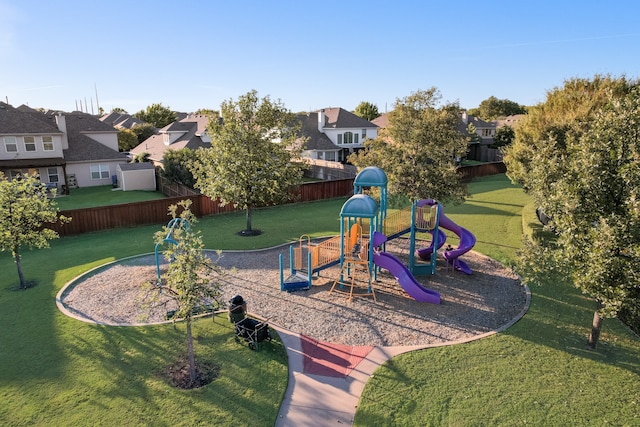 view of playground with a yard