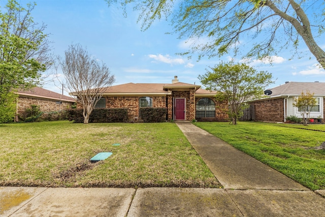 ranch-style house with a front lawn