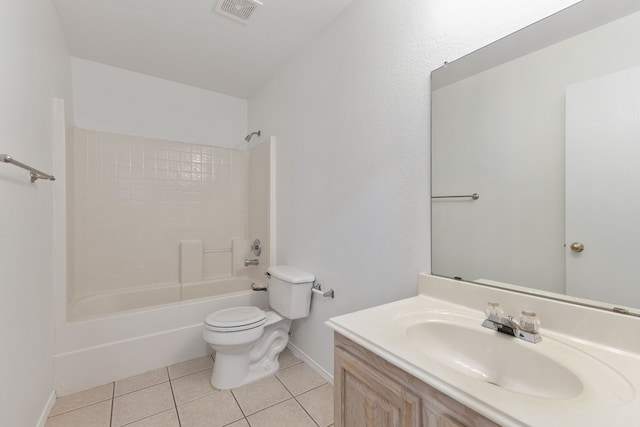 full bathroom with toilet, vanity, tile patterned floors, and shower / washtub combination