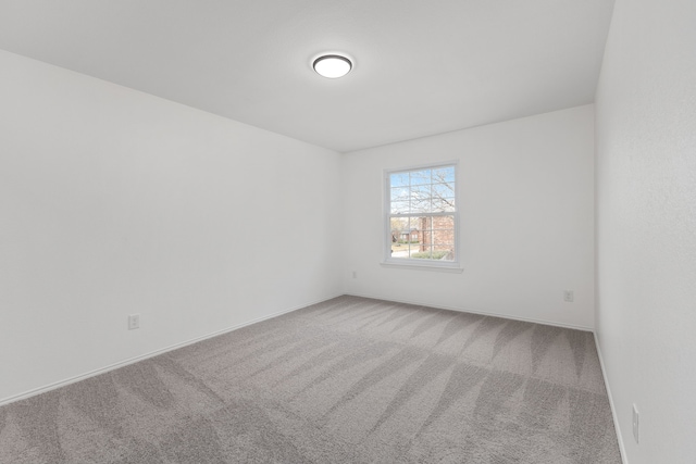 empty room featuring carpet floors