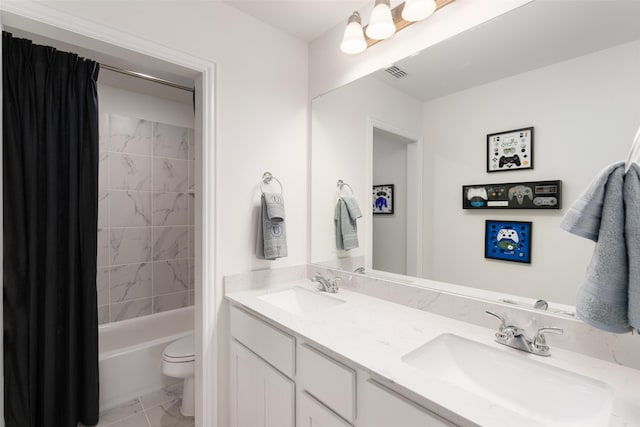 full bathroom featuring shower / tub combo with curtain, vanity, and toilet