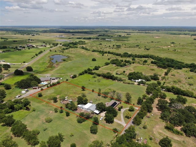 bird's eye view featuring a rural view and a water view