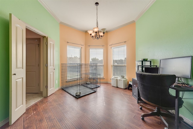 office space with hardwood / wood-style flooring, an inviting chandelier, and crown molding