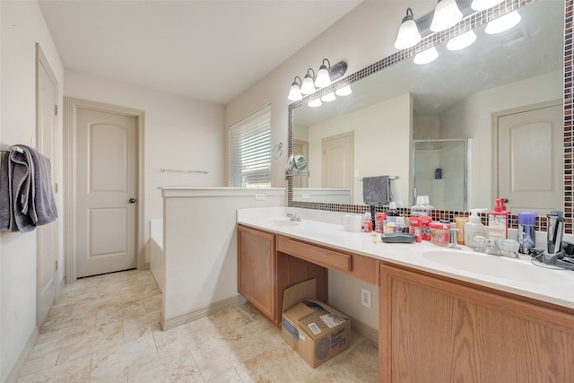 bathroom with shower with separate bathtub and vanity