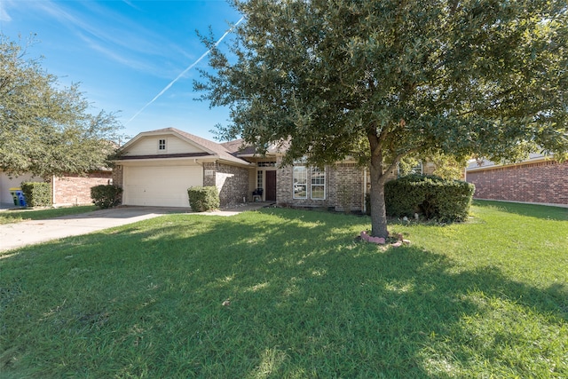 view of front facade with a front lawn and a garage