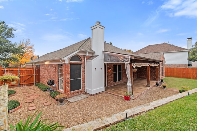 4721 Layla Rd, Arlington, TX 76016 - rear view of house with brick siding, a gate, roof with shingles, a chimney, and a wooden deck