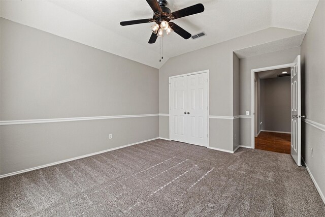 4721 Layla Rd, Arlington, TX 76016 - unfurnished bedroom with vaulted ceiling, carpet flooring, a closet, baseboards, and ceiling fan