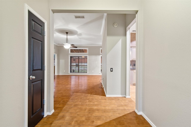 corridor with light hardwood / wood-style flooring