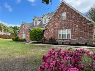 view of front of property with a front lawn