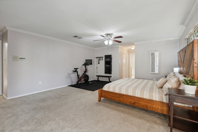 bedroom with carpet flooring, ceiling fan, and crown molding