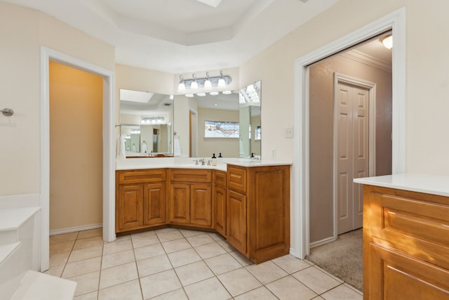 bathroom featuring tile patterned flooring and vanity