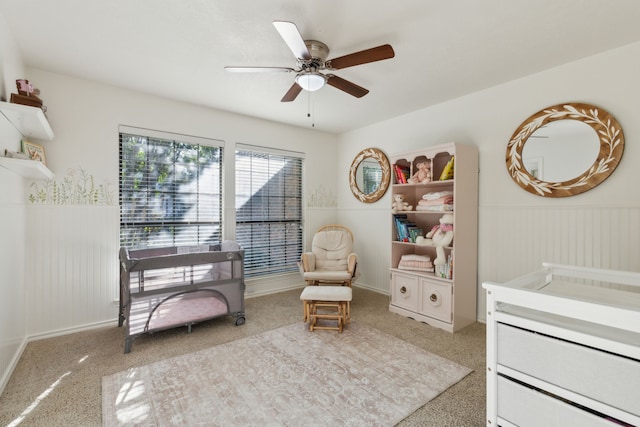 sitting room with light carpet and ceiling fan